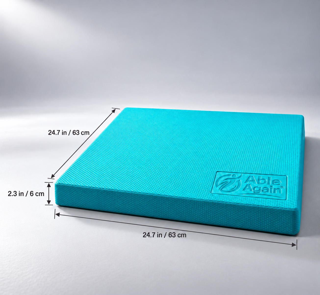 Teal Able Again balance pad with dimensions 24.7 inches by 24.7 inches and 2.3 inches thick
